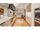 Elegant kitchen with custom cabinetry, stainless steel appliances, and a large island for entertaining at 28890 Pinewood Vista Dr, Evergreen, CO 80439