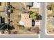 Overhead view of property, showing landscaping, deck, and picnic table at 5200 W Ottawa Ave, Littleton, CO 80128