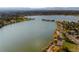 Gorgeous aerial view of lake, with walking path and lush green space at 1284 Quitman St, Denver, CO 80204