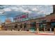 Exterior shot of the Edgewater Public Market, with a variety of eateries showcased at 1284 Quitman St, Denver, CO 80204