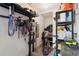 Organized garage storage featuring shelving and various sporting goods at 1284 Quitman St, Denver, CO 80204