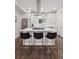 Sleek kitchen with modern appliances, island and stylish seating at 1284 Quitman St, Denver, CO 80204