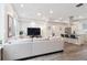 Bright and spacious living room featuring modern decor and an open layout to the kitchen area at 1284 Quitman St, Denver, CO 80204