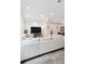 Open-concept living room with modern furnishings and ample natural light at 1284 Quitman St, Denver, CO 80204