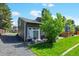 A cozy home with a lush green lawn, a patio and outdoor barbeque at 5415 W 16Th Ave, Lakewood, CO 80214