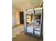 Charming bedroom features a bunk bed with a ladder, perfect for creating fun and functional space at 8503 E Jamison Ave, Centennial, CO 80112