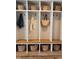 Organized mudroom with individual storage cubbies, hooks, and shelves at 8503 E Jamison Ave, Centennial, CO 80112