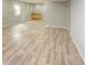Vast basement area with windows, wood flooring, and recessed lighting at 12948 E 106Th Way, Commerce City, CO 80022