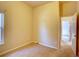 Bedroom with neutral carpet and an open doorway at 12948 E 106Th Way, Commerce City, CO 80022