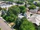 Scenic aerial view of the neighborhood showcasing mature trees and well-maintained homes at 160 Monroe St, Denver, CO 80206