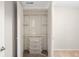 A closet with shelving, wire racks and plastic storage bins at 8512 W Star Cir, Littleton, CO 80128