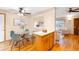 Inviting dining area featuring a glass-top table and comfortable seating at 8512 W Star Cir, Littleton, CO 80128