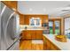Spacious kitchen with stainless steel appliances and ample counter space at 8512 W Star Cir, Littleton, CO 80128