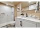 Bathroom with white tile shower, vanity, and modern fixtures at 2227 Canyon Blvd # 162B, Boulder, CO 80302
