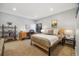 Cozy bedroom with neutral tones, a comfortable bed, and a dedicated workspace at 2227 Canyon Blvd # 162B, Boulder, CO 80302