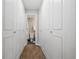 Hallway with closets leading to a bathroom at 2227 Canyon Blvd # 162B, Boulder, CO 80302