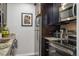 Efficient kitchen featuring stainless steel appliances, granite countertops, and sleek cabinetry at 2227 Canyon Blvd # 162B, Boulder, CO 80302