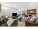 Spacious living room boasts an open layout, fireplace, comfortable furniture, and view to dining area at 2227 Canyon Blvd # 162B, Boulder, CO 80302