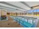 Inviting indoor pool area with ample natural light and a relaxing atmosphere at 2227 Canyon Blvd # 162B, Boulder, CO 80302