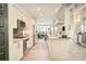 Modern kitchen featuring stainless steel appliances, granite countertops, and an open layout at 3198 Blake St # 502, Denver, CO 80205