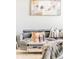 Comfortable living room featuring a stylish sofa, decor, and a coffee table at 3198 Blake St # 502, Denver, CO 80205