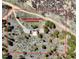 Aerial view of mountain acreage with home site and wooded surroundings at 548 Coughlin Meadows Rd, Boulder, CO 80302