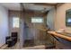 Modern bathroom with river rock shower and a unique sink at 548 Coughlin Meadows Rd, Boulder, CO 80302