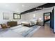 Virtually staged bedroom featuring a bed, dresser, nightstand, and rug at 548 Coughlin Meadows Rd, Boulder, CO 80302