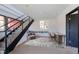 Virtually staged hallway featuring a desk, chair, rug, and wall art at 548 Coughlin Meadows Rd, Boulder, CO 80302