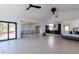 Open-concept layout with access to a deck and living areas with a vaulted ceiling at 548 Coughlin Meadows Rd, Boulder, CO 80302