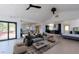Virtually staged open floor plan with access to a deck and cozy living areas at 548 Coughlin Meadows Rd, Boulder, CO 80302