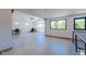 Large open-concept living room with vaulted ceilings and an abundance of natural light at 548 Coughlin Meadows Rd, Boulder, CO 80302