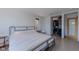 Brightly lit main bedroom with a seating area and closet at 548 Coughlin Meadows Rd, Boulder, CO 80302