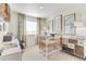 Charming Bedroom with a crib, playful decor, and abundant natural light, creating a welcoming space for a  at 22315 E 6Th Ave, Aurora, CO 80018
