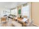 Open-concept dining area with abundant natural light, seamlessly connected to the living space at 22315 E 6Th Ave, Aurora, CO 80018