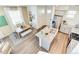 Modern kitchen and dining area with granite counters and stainless steel appliances at 22315 E 6Th Ave, Aurora, CO 80018