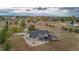 Aerial view showcasing house with backyard patio and landscaping at 12628 N 3Rd St, Parker, CO 80134