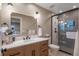 Modern bathroom with a large mirror and walk-in shower at 12628 N 3Rd St, Parker, CO 80134