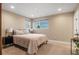 Cozy bedroom with a queen bed and ample natural light at 12628 N 3Rd St, Parker, CO 80134