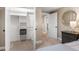 Bright bedroom featuring an open closet with shelving, rod and organized storage at 12628 N 3Rd St, Parker, CO 80134