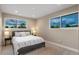 Spacious bedroom with large windows and a comfortable bed at 12628 N 3Rd St, Parker, CO 80134