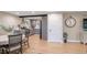 Open floor plan reveals a dining area flowing into an updated kitchen with modern appliances at 12628 N 3Rd St, Parker, CO 80134