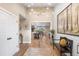 Entryway looking toward kitchen, showcasing open floor plan at 12628 N 3Rd St, Parker, CO 80134