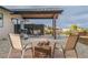 Outdoor patio area with a cozy fire pit, ideal for relaxing and entertaining at 12628 N 3Rd St, Parker, CO 80134