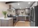 Stylish kitchen features stainless appliances, modern countertops, and updated fixtures at 12628 N 3Rd St, Parker, CO 80134