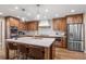 Modern kitchen with stainless steel appliances and large island at 12628 N 3Rd St, Parker, CO 80134