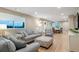 Cozy living room with plush seating, a dining area, and ample natural light at 12628 N 3Rd St, Parker, CO 80134