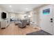 Inviting living room features light-colored walls, a modern seating arrangement and bright, natural light at 12628 N 3Rd St, Parker, CO 80134