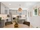 Modern kitchen with quartz countertops, stainless steel appliances, and ample storage space at 1380 Magnolia St, Denver, CO 80220