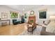Spacious living room with modern decor, hardwood floors, and a cozy seating area at 1380 Magnolia St, Denver, CO 80220